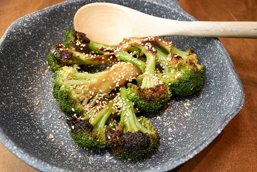 Sesame broccoli cooked in a coffee shop in Canada