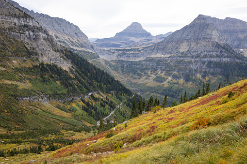 Hiking on the Highline Trail in Glacier National Park, Montana in the fall.