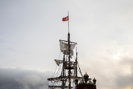 Vintage wooden ship with Turkish flag