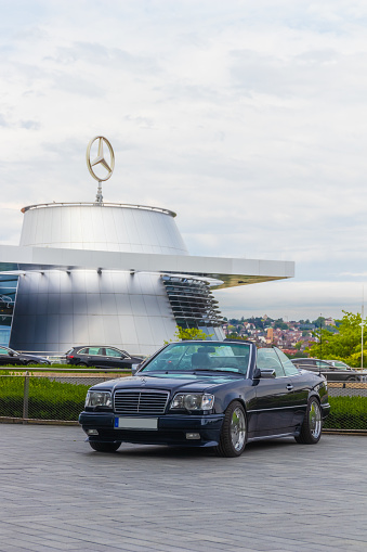 Stuttgart, Germany - August 2, 2020: Mercedes-Benz E 320 cabrio german oldtimer car at the Mercedes-Benz Museum.