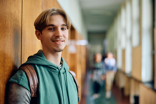 Portrait of smiling high school student looking at camera.