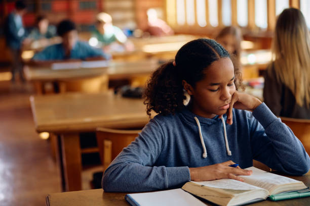 istock Black female high school student learning in the classroom. 1912513664