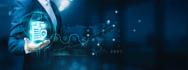 istock Businessman hand-holding security compliance icons with a secure network connection. Ensuring the growth of the organization's security and compliance for a robust and resilient business environment. 1912724796