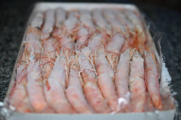 istock Red king frozen shrimp in a box 1912741749