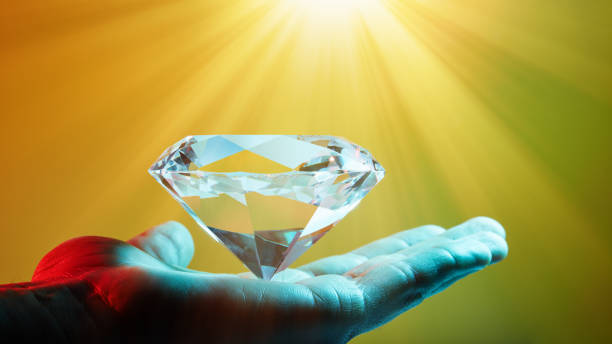 Beautiful sparkling diamond in hand