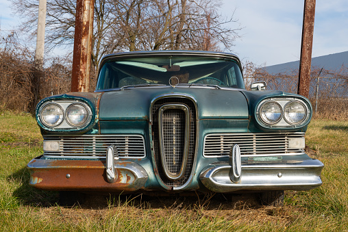 Rusted classic car on historic Route 66 in Chenoa, Illinois, USA.