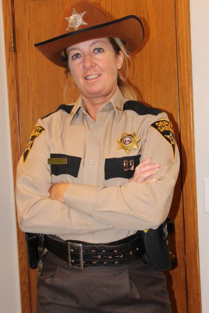 istock female Sheriff's deputy, (Captain), Mature, white, 1912934158