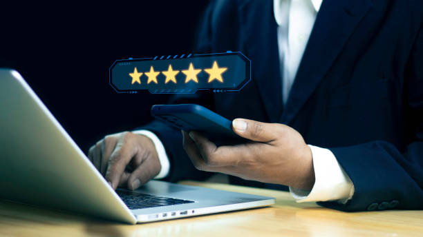 istock User gives rating to service experience on online application, Customer review satisfaction feedback survey concept, Customer can evaluate quality of service leading to reputation ranking of business. 1912963516