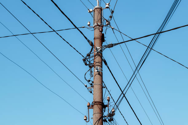 istock Overhead power lines. Telephone cable. Internet communications. 1912979121