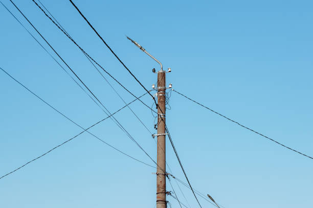 istock Overhead power lines. Telephone cable. Internet communications. 1912981809