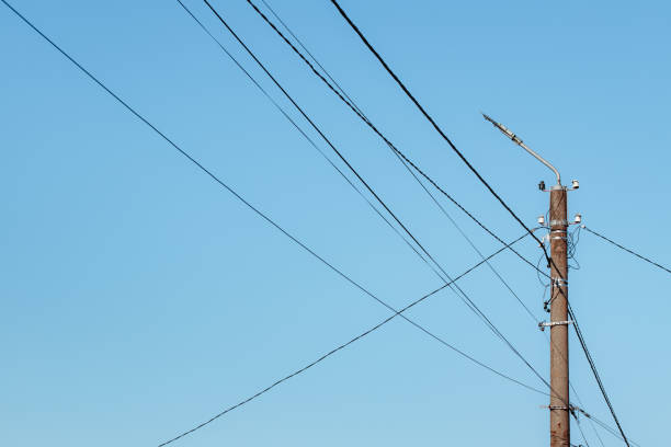 istock Overhead power lines. Telephone cable. Internet communications. 1912982317