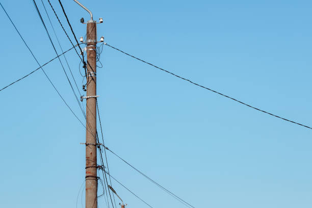 istock Overhead power lines. Telephone cable. Internet communications. 1912984937
