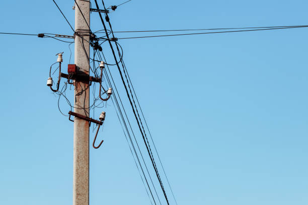 istock Overhead power lines. Telephone cable. Internet communications. 1912988645