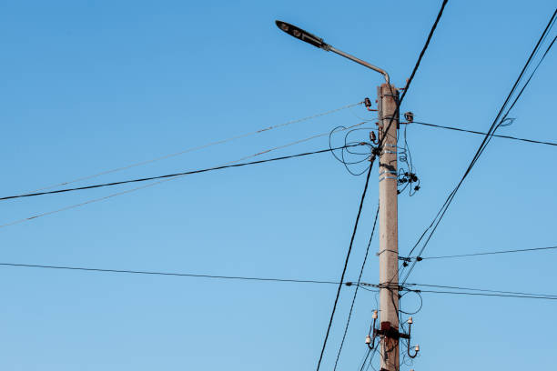 istock Overhead power lines. Telephone cable. Internet communications. 1912988659