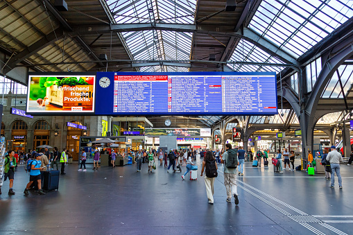 Zurich, Switzerland - August 10, 2023: Departure board for trains at main railway station in Zurich, Switzerland.