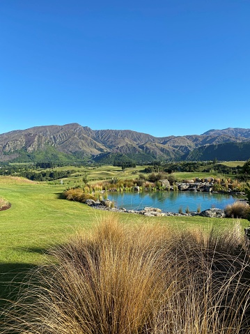 View over The Hills golf course towards Arrowtown, New Zealand.