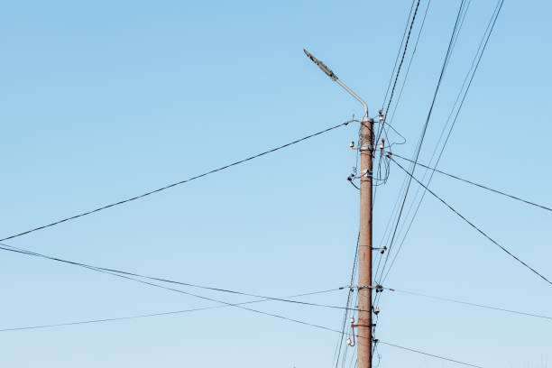 istock Overhead power lines. Telephone cable. Internet communications. 1912994405