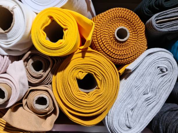 istock Samples of cloth and fabrics in different colors found at a fabrics market 1912996488