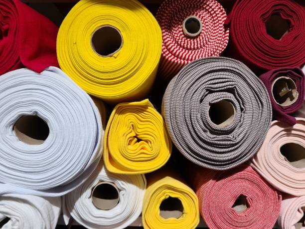 istock Samples of cloth and fabrics in different colors found at a fabrics market 1912996503