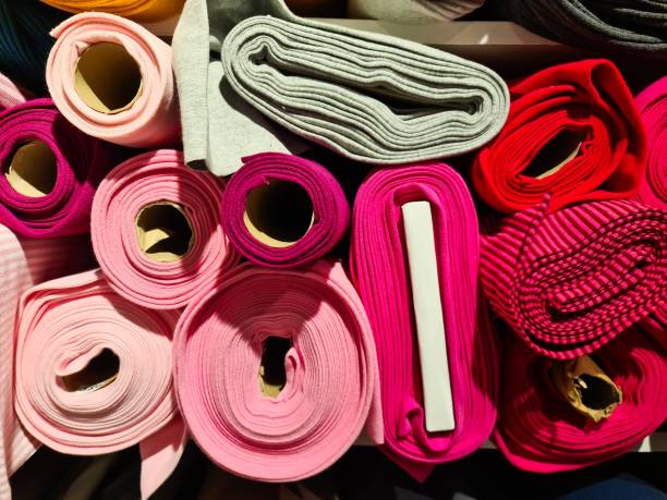 istock Samples of cloth and fabrics in different colors found at a fabrics market 1912997032