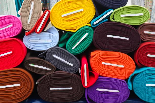 istock Samples of cloth and fabrics in different colors found at a fabrics market 1912997544