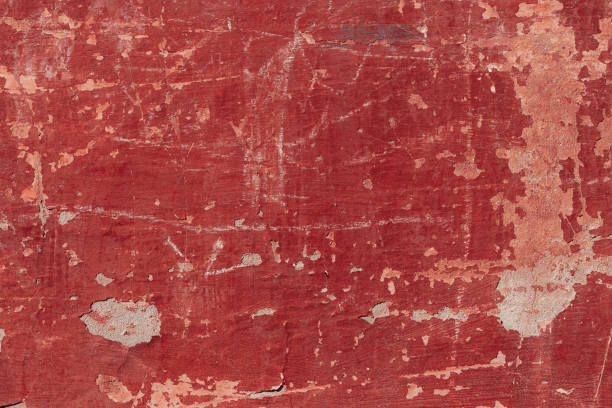 istock Scary red concrete wall with deep scratches and chips. Various variations of abrasions. 1913005579