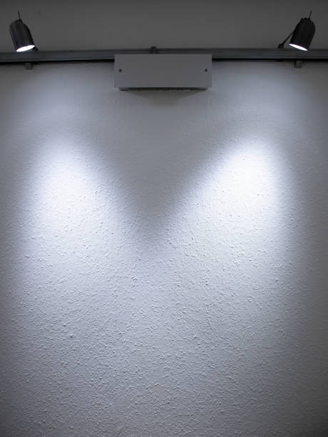 istock Light on the wall. Light gray or blue glass, illuminated by lanterns 1913022312