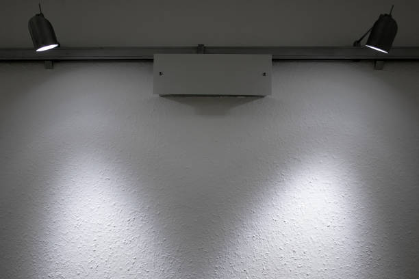 istock Light on the wall. Light gray or blue glass, illuminated by lanterns 1913023328