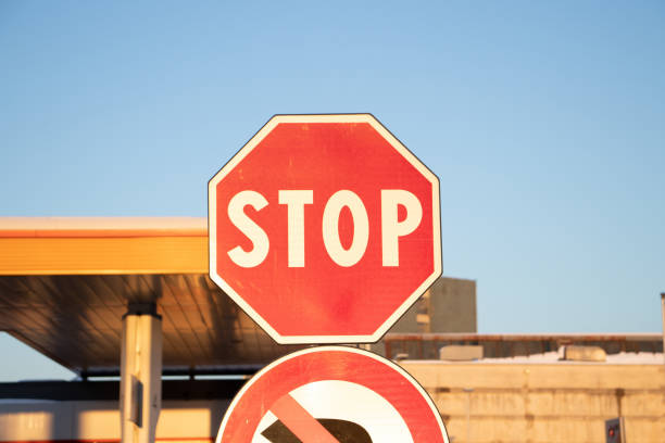 Stop sign, blue sky in the background