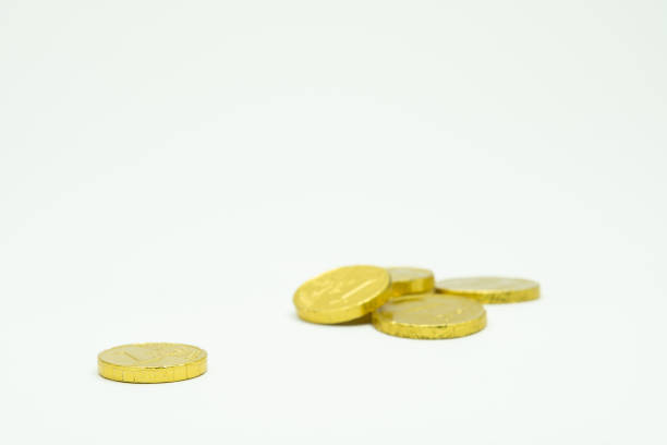 istock Golden chocolate coins isolated on white copy space 1913064377