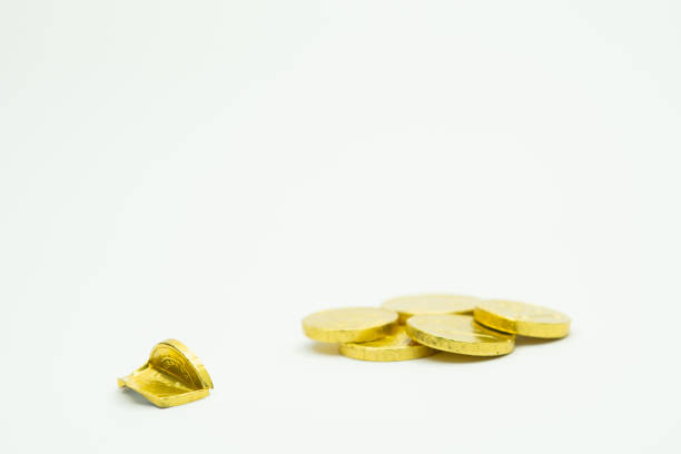 istock Golden chocolate coins isolated on white copy space 1913069001