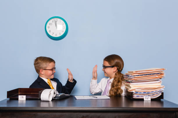 istock Boy and Girl Team working Together 1913108345