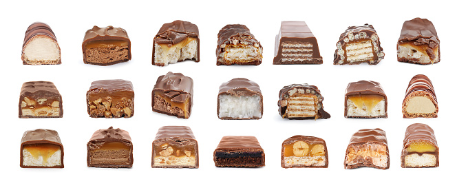 Set with many yummy chocolate bars isolated on white