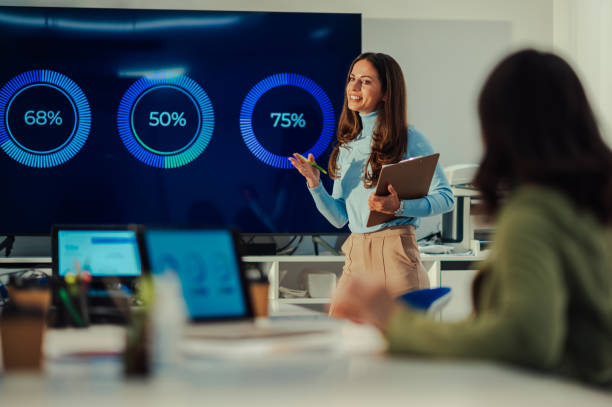 istock Woman team leader having fun while speaking at office brainstorming 1913125751