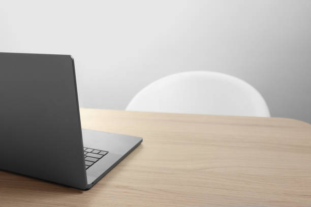 istock Stylish modern laptop on wooden table indoors. Space for text 1913183847