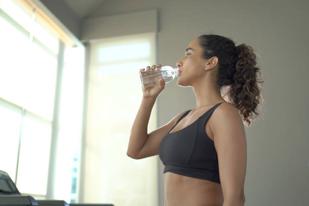 istock Healthy woman exercise in gym. 1913214662