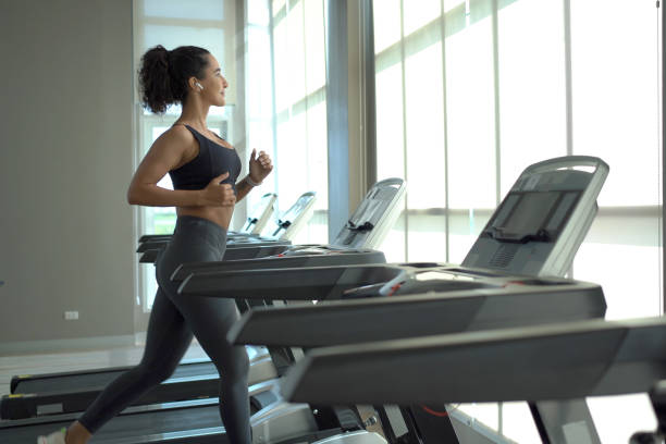 istock Healthy woman exercise in gym. 1913215180