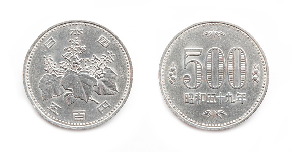 old 500 yen coin on white background