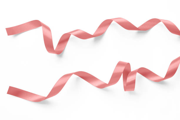 istock Rose gold pink ribbon satin bow scroll set isolated on white background with clipping path for Christmas and wedding card confetti design decoration element 1913242429
