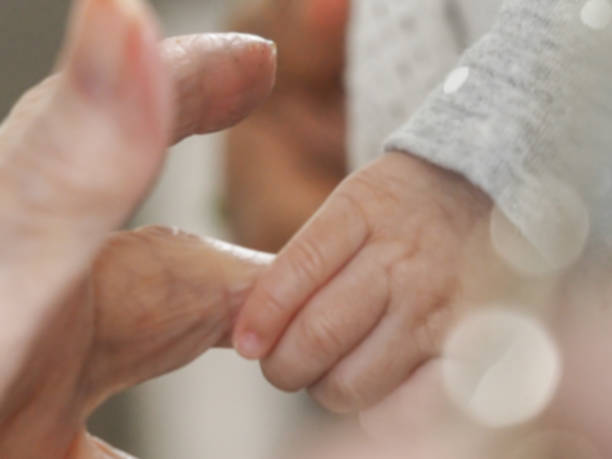 istock Seen on two hands coming together with a blurred rendering 1913252482