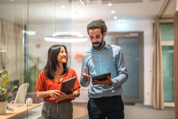 istock Multiracial Team Working with Digital Tablet in Corporate Office 1913376884