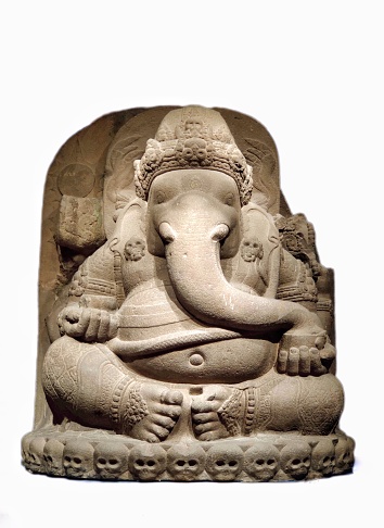 Lord Ganesha in a sitting pose is at the National Museum in Thailand.