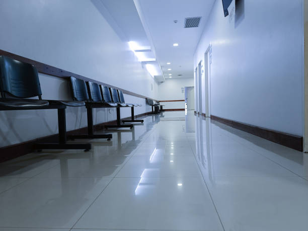 istock Empty waiting room with black chairs in the medical office. 1913474325