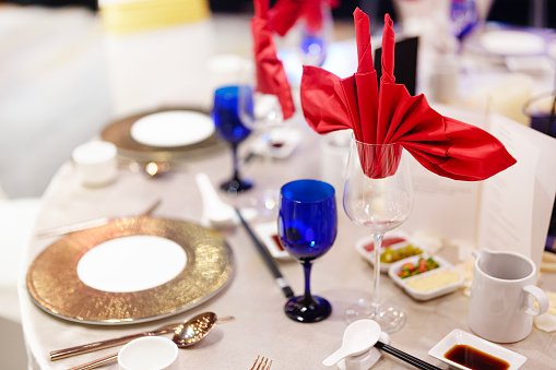 Close-up of an Asian-style table setting at a wedding reception