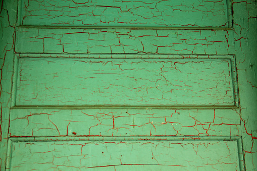 A green weathered door.