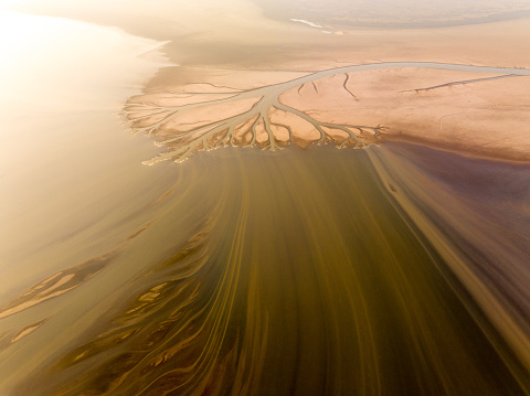 Traces of flowing water on the lake, abstract picture