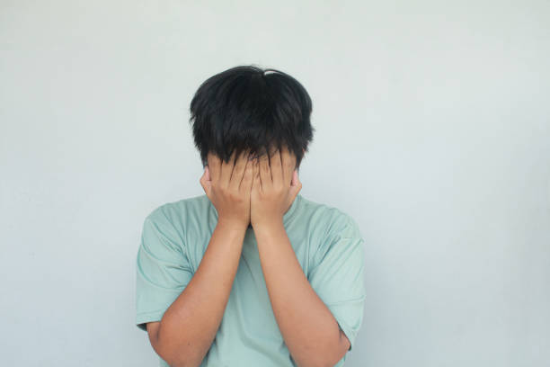 istock Stressed depressed asian young man. 1913876948