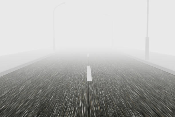 Color pop on the double yellow lines of a road, leading into the foggy and mysterious unknown.
