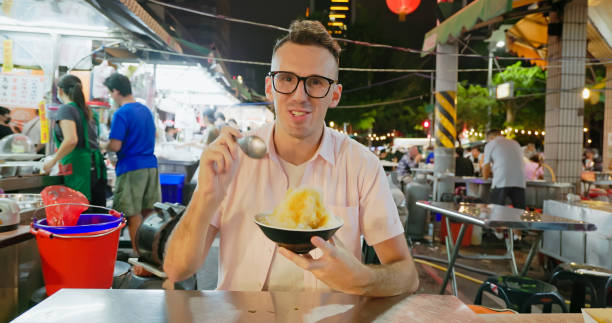 istock man visit the night market 1913913031