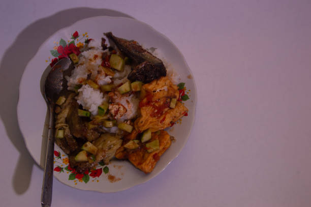 rice with a side dish of chili tofu and Indonesian shrimp paste fish from East Java.